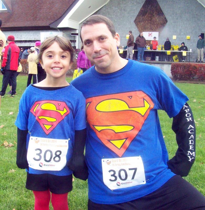 Natalie and Nathan Meleo are ready to run faster than a speeding bullet in their Superman T-shirts. BY MATTHEW BERNAT